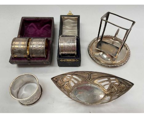 Pair of silver napkin rings in a fitted case, a single silver napkin ring in fitted case, German silver (800) bonbon dish, si
