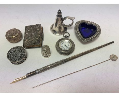 Group of silver and white metal to include a silver dip pen, silver heart shaped salt with blue glass liner, silver cased fob