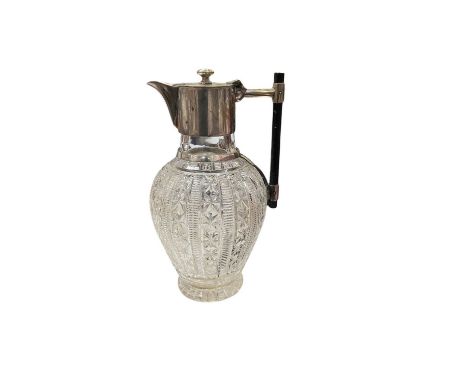 Late Victorian cut glass claret jug with Christopher Dresser style mounts