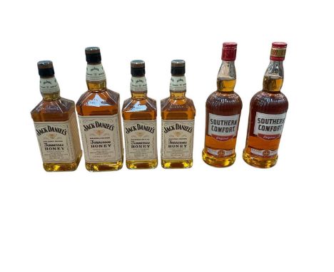 Six bottles of Whiskey containing Jack Daniel's and Southern Comfort