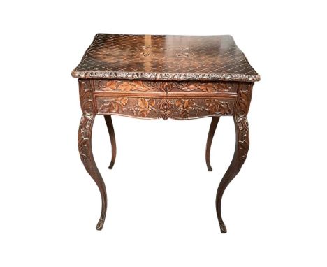 Nineteenth century two drawer side table with leaf carved decoration on cabriole legs, 59.5cm wide, 46cm deep, 75cm high