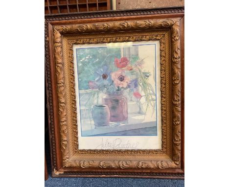 Four pictures, including a still life print, framed cigarette cards, a signed Tim Thompson print of The America's Cup, and a 