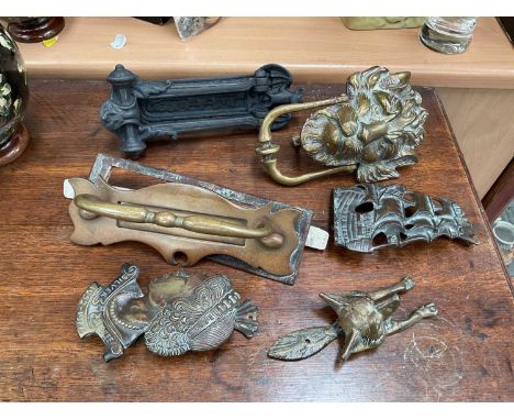 Group of Victorian and later door knockers and letter boxes