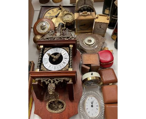 Contemporary wall clock, together with various mantel clocks, travel time pieces and two barometers