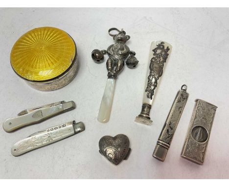Silver and mother of pearl child's bear rattle, silver and mother of pearl desk seal, two silver and mother of pearl fruit kn