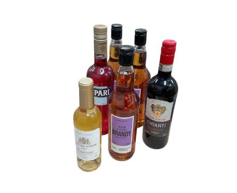 Group of six bottles of wine and brandy.