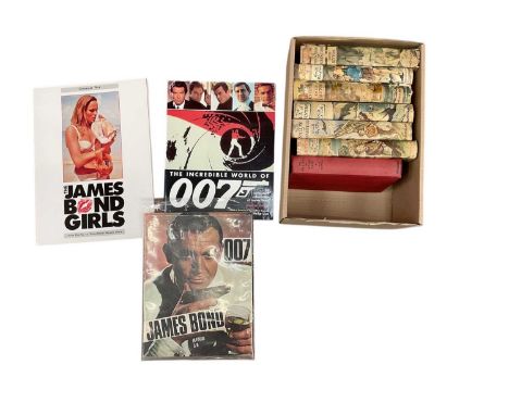 Group of Enid Blyton hardbacks and James Bond magazines 