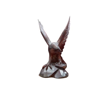 North American carved wooden sculpture of an eagle.