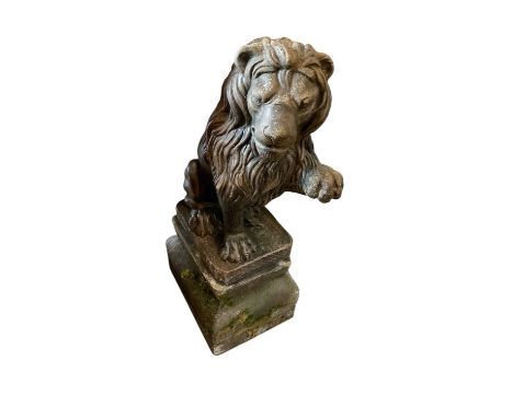 Concrete lion sculpture on plinth. Approximately 86cm tall by 30cm wide by 47 deep.