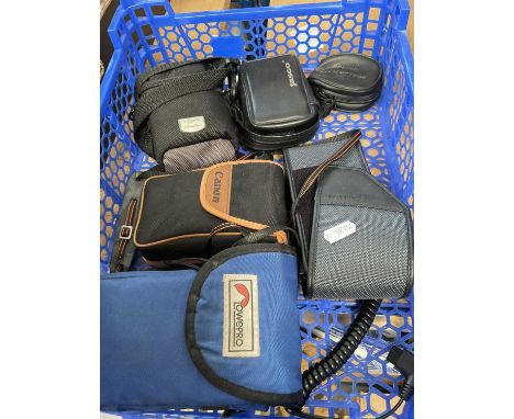 Canon Powershot camera, Tasio binoculars, Boeing helicopter glasses