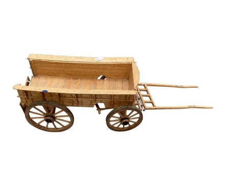 Scratch built wooden model of a hay cartApproximately 56cm long x 16cm wide 15.5cm tall, the hinge for the back is damaged an