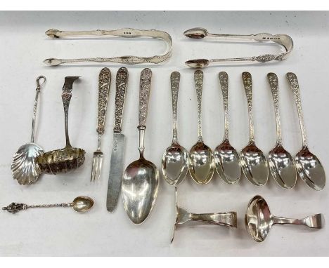 Group of Georgian and later silver flatware inlcuding a set of six teaspoons, two pairs of sugar tongs, caddy spoons etc 