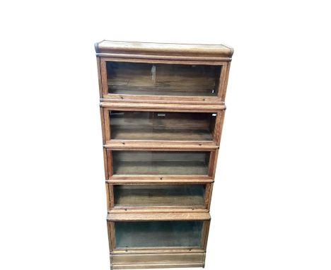 Early 20th century oak five tier Globe-Wernicke bookcase bearing labels, 86.5cm wide, 35.5cm deep, 193cm highVery good condit