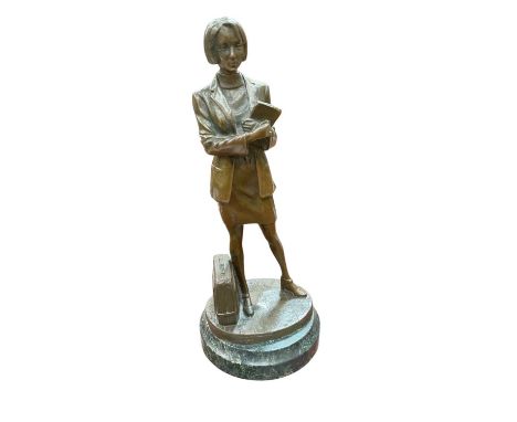 Modern bronze figure of a traveller, on marble base, 30cm in overall height.