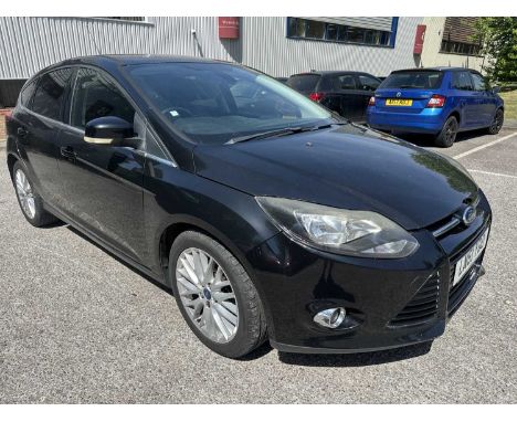 2011 Ford Focus 1.6 EcoBoost Titanium, manual 5 door hatchback, reg. no. LN61 YDO, finished in black with a cloth interior. T