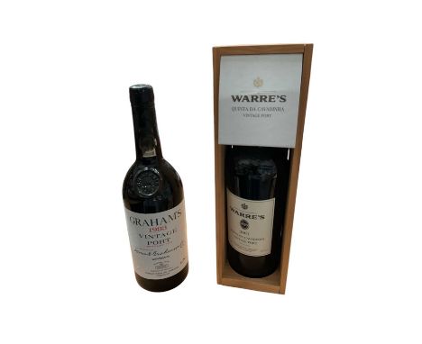 Warre 2001 Quinta da Cavadinha vintage port in case, and a bottle of Graham's 1983 vintage port (leaking slightly) (2 bottles