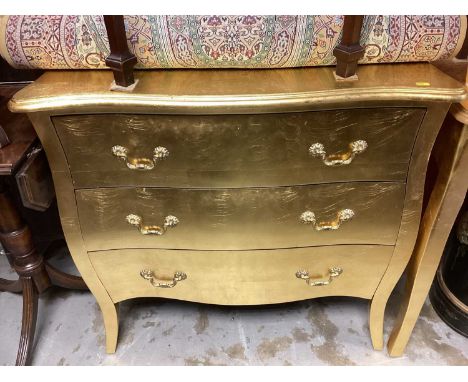 Gilded bombé-shape chest of three drawers and a matching side table