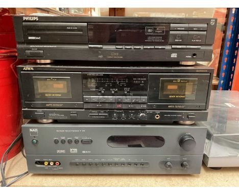 NAD Surround Sound Receiver T 751 with remote and owners manual, AIWA stereo cassette deck AD-WX777, Philips CD 610 compact d