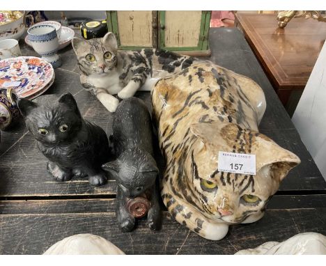 Two Winstanley cats and two other cat ornaments 