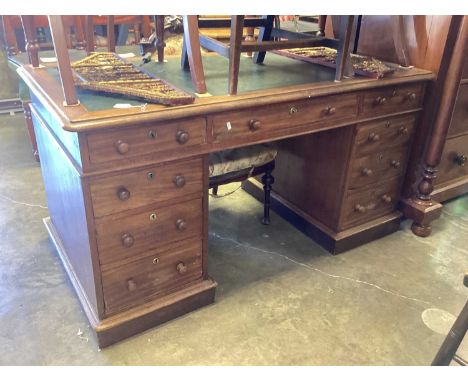 Victorian mahogany twin pedestal desk with lined top and nine drawers, 152cm wide, 81cm deep, 79cm high