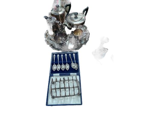 Silver plated four piece tea set, silver plated salver, hot water pot from Butlins, toast rack and teaspoons.