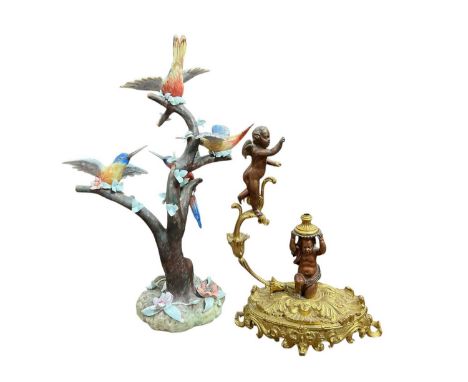 Decorative ormolu lamp base, 23cm high, together with a Portuguese porcelain bird groupTheir is two small chips to the corner