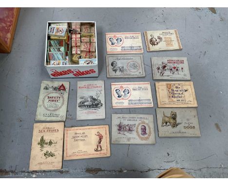 Box of cigarette cards, in boxes and in albums, including 1930s
