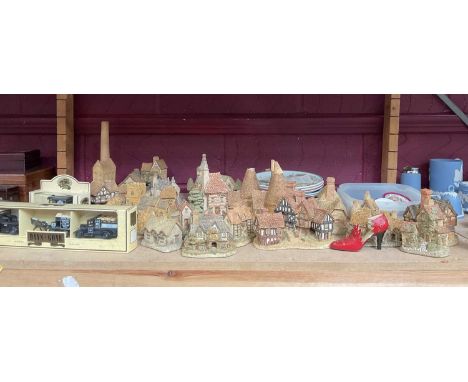 Large quantity of ceramics and other sundry items including a large lot of David Winter cottage's (3 shelves)