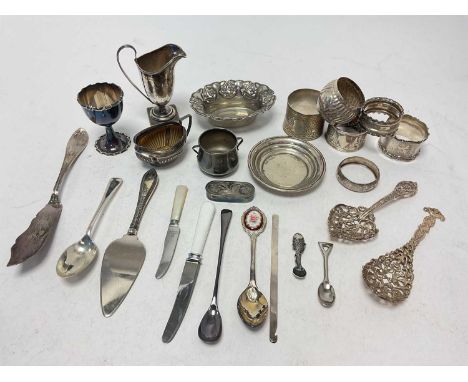 Group of silver to include napkin rings, chew jug, egg cup, dishes etc together with some plated flatware etc