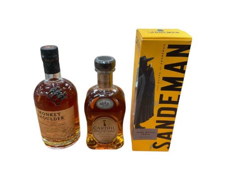 Two bottles of whiskey to include Monkey Sholder and Cardhu, and one bottle of Sandeman