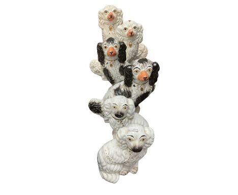 Three pairs of 19th century Staffordshire spaniels