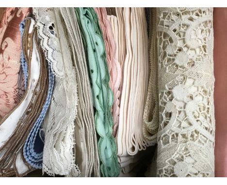 Quantity of good worked tables linens and table sets plus a pink damask sofa loose cover. Length of 'Canton' cotton fabric.