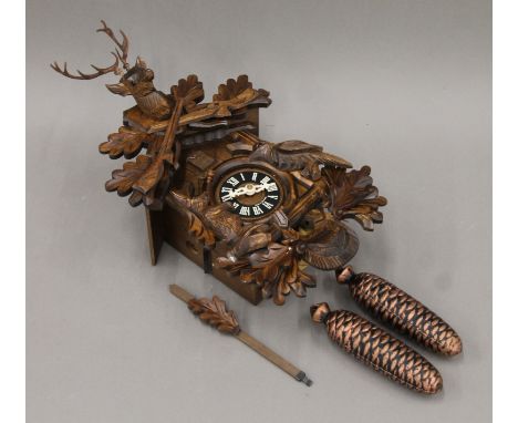 A cuckoo clock in original box. The clock 30 cm high.