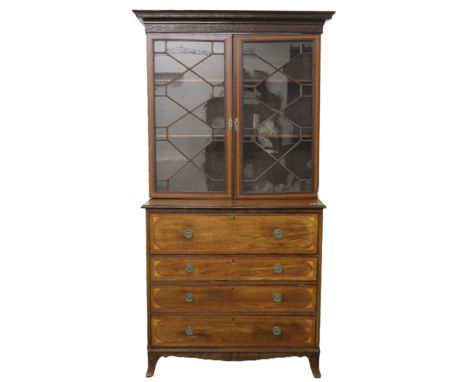 A 19th century mahogany secretaire with associated bookcase top. 125 cm wide x 226 cm high.
