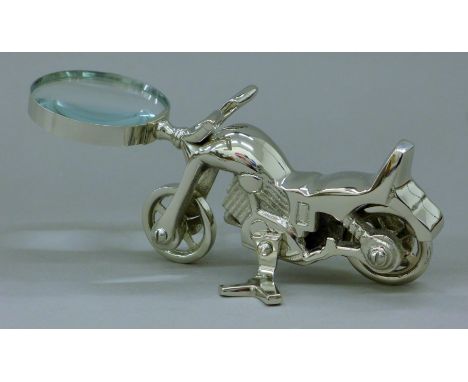A motorbike-handled magnify glass. 23 cm long.