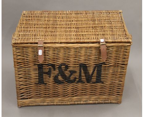 A Fortnum & Mason hamper. 59 cm wide.