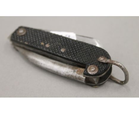 A G Ibberson & Co Sheffield Broad Arrow Crows Foot 1942 jack knife with marlin spike, knife, can opener and screwdriver, with