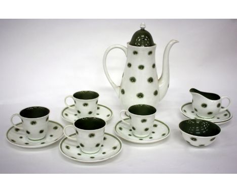 A SUSIE COOPER BONE CHINA ONE O'CLOCKS PATTERN COFFEE SERVICE to include four cups, six saucers, milk jug, sugar bowl and cof