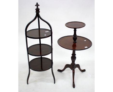 AN EDWARDIAN MAHOGANY THREE TIER CAKE STAND with urn finial and shaped square section support, each tier 30cm diameter; and a