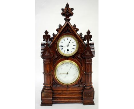 AN ANTIQUE OAK CASED MANTLE CLOCK AND BAROMETER, two circular dials, overall 28cm wide x 49cm high