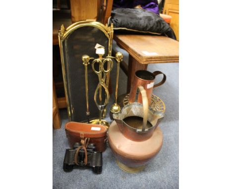 A BRASS FIRESIDE COMPANION SET together with a pierced brass trivet on tripod base, a copper bucket with loop handle, a small