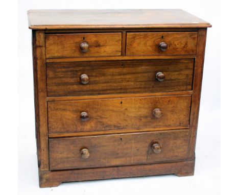 A VICTORIAN MAHOGANY CHEST of two short and three long drawers with turned knob handles and bracket feet 102cm wide 