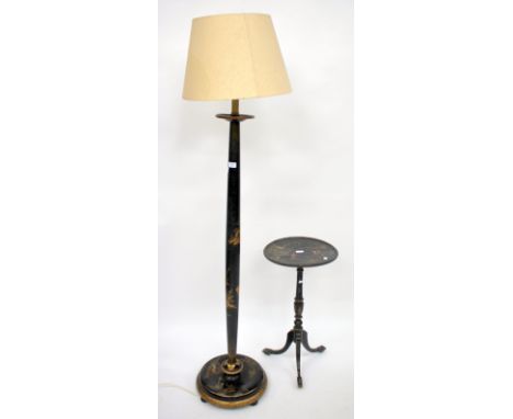 A LATE 19TH / EARLY 20TH CENTURY CHINOSERIE LACQUERED STANDARD LAMP with a turned column support, circular base and bun feet,