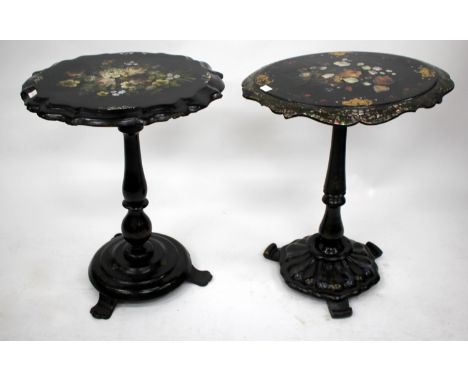 TWO 19TH CENTURY PAPIER MACHE TILT TOP TABLES each with mother of pearl inlay and hand painted floral decoration, the largest