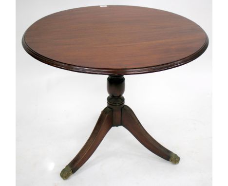 A VICTORIAN MAHOGANY CIRCULAR TILT TOP TRIPOD TABLE, the top 87cm diameter