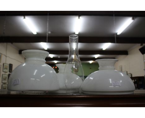 A VICTORIAN BRASS HANGING OIL LAMP with an opaque white glass shade, overall 70cm in length together with further metalware, 