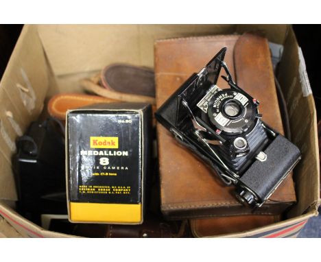 TWO PAIRS OF OLD BINOCULARS,  a Kershaw 820 penguin camera, an old Polaroid camera etc
