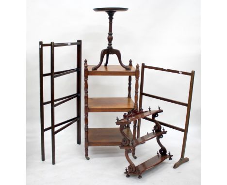 A VICTORIAN MAHOGANY THREE TIER WHATNOT with turned finial supports and brass castors 46cm wide together with two towel rails