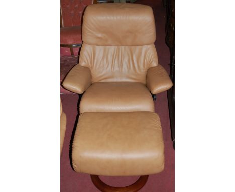 A Stressless light tan leather upholstered swivel armchair, with matching footstool (2)