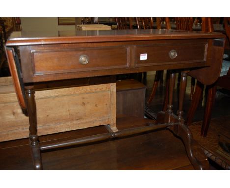 A reproduction mahogany drop flap two drawer sofa table